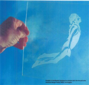 Example of sandblasted swimmer, part of the Shared Skies artwork for the new YMCA.